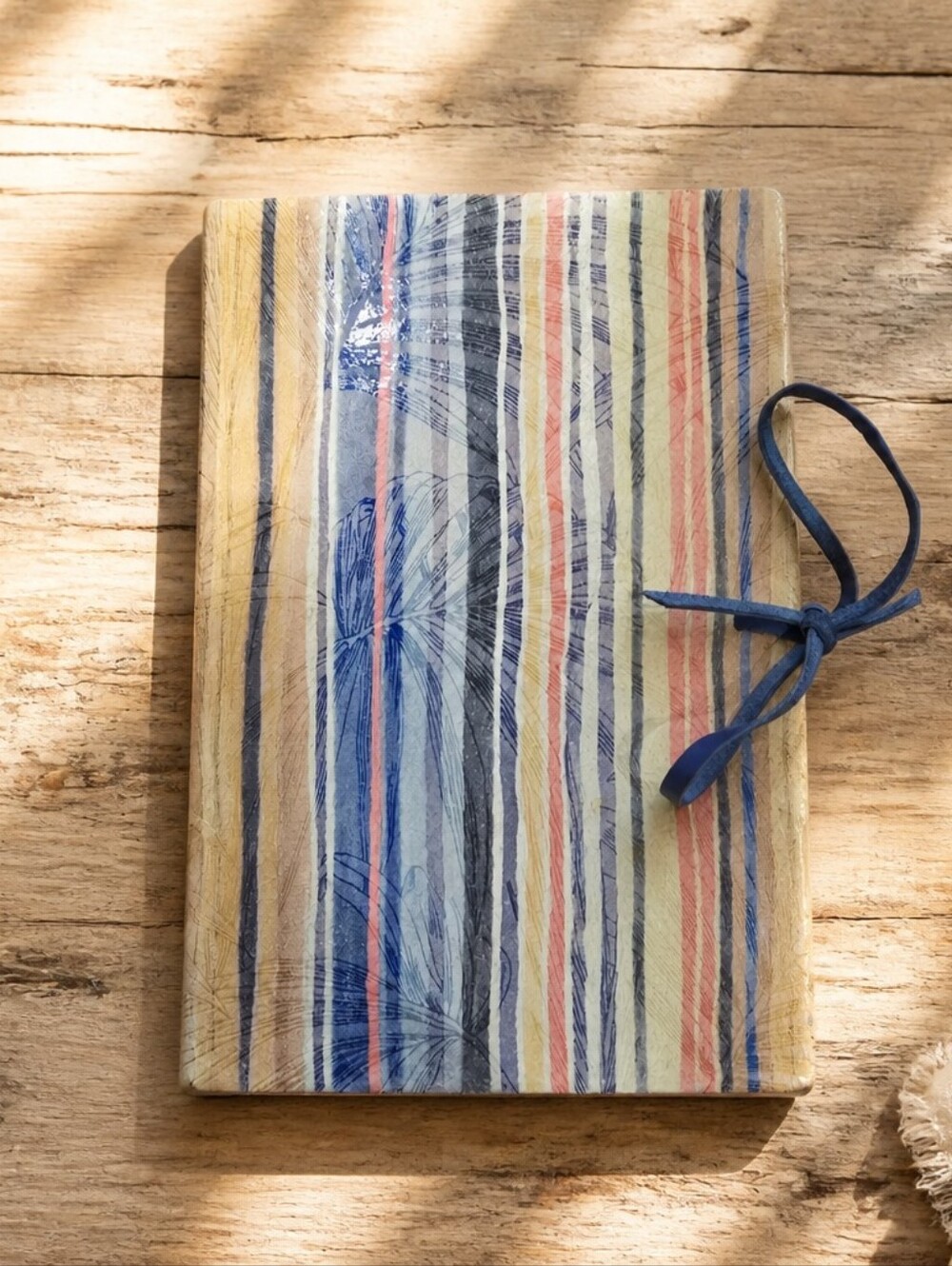 (#3) NWOT leather-bound wrap journal featuring a multi-colored vertical stripe